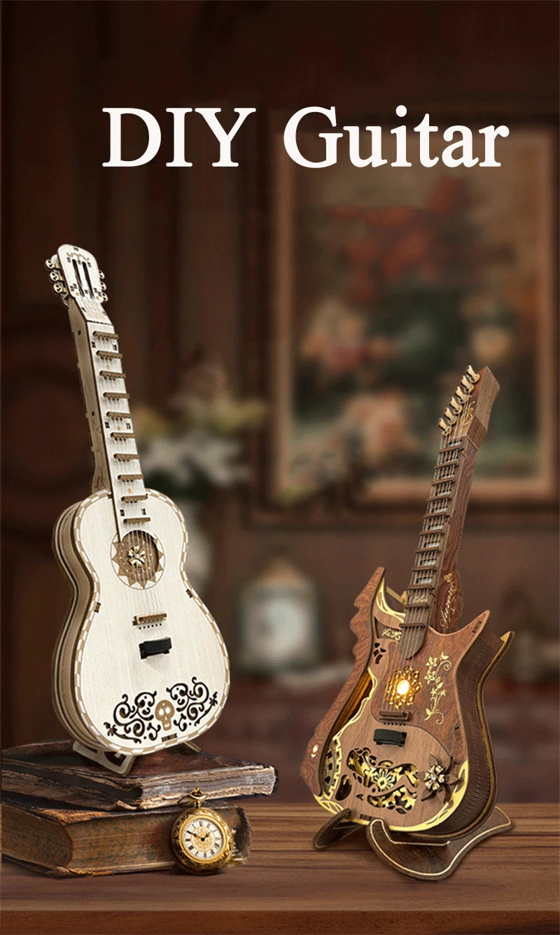 A DIY guitar model kit featuring a wooden miniature guitar and a gold-accented electric guitar, displayed on a wooden surface