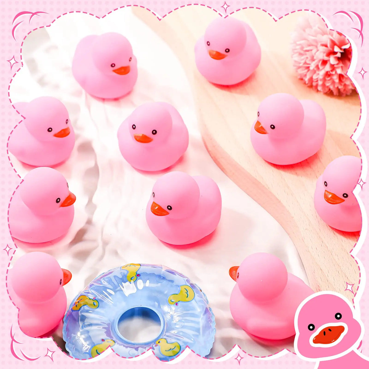 A set of pink mini rubber ducks resting on a wooden surface with soft fabric background.