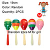 Four wooden sand hammers in various colors and designs for children