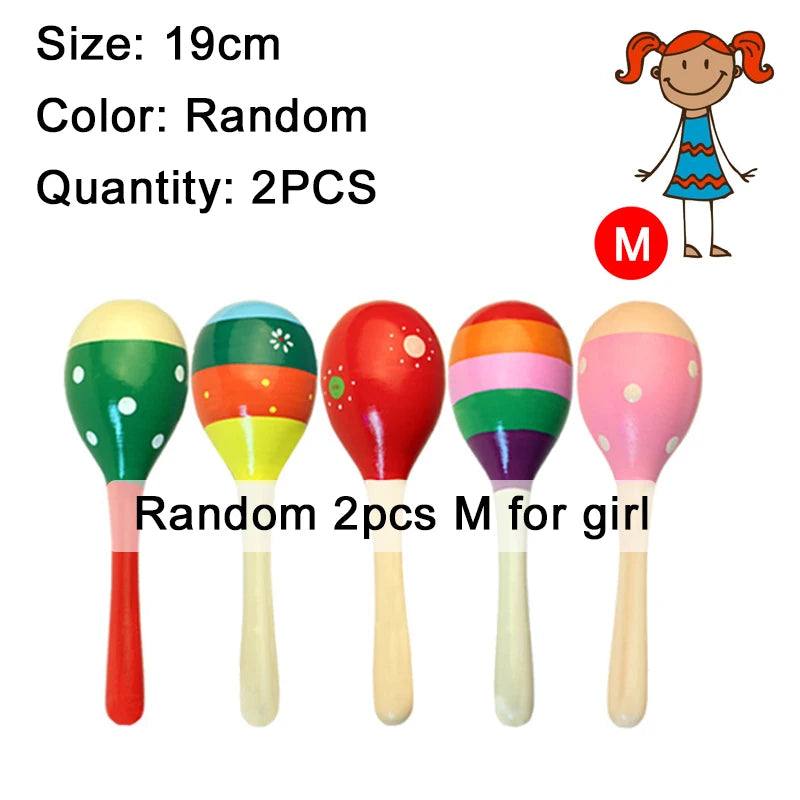 Four wooden sand hammers in various colors and designs for children
