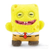 A yellow SpongeBob SquarePants plush toy with a smiling face and a brown Patrick Star plush toy.