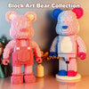 A collection of pink and blue block art bears built from colorful plastic bricks.