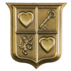 A brass-colored enamel pin brooch featuring a shield design with a heart, a key, and a lion.