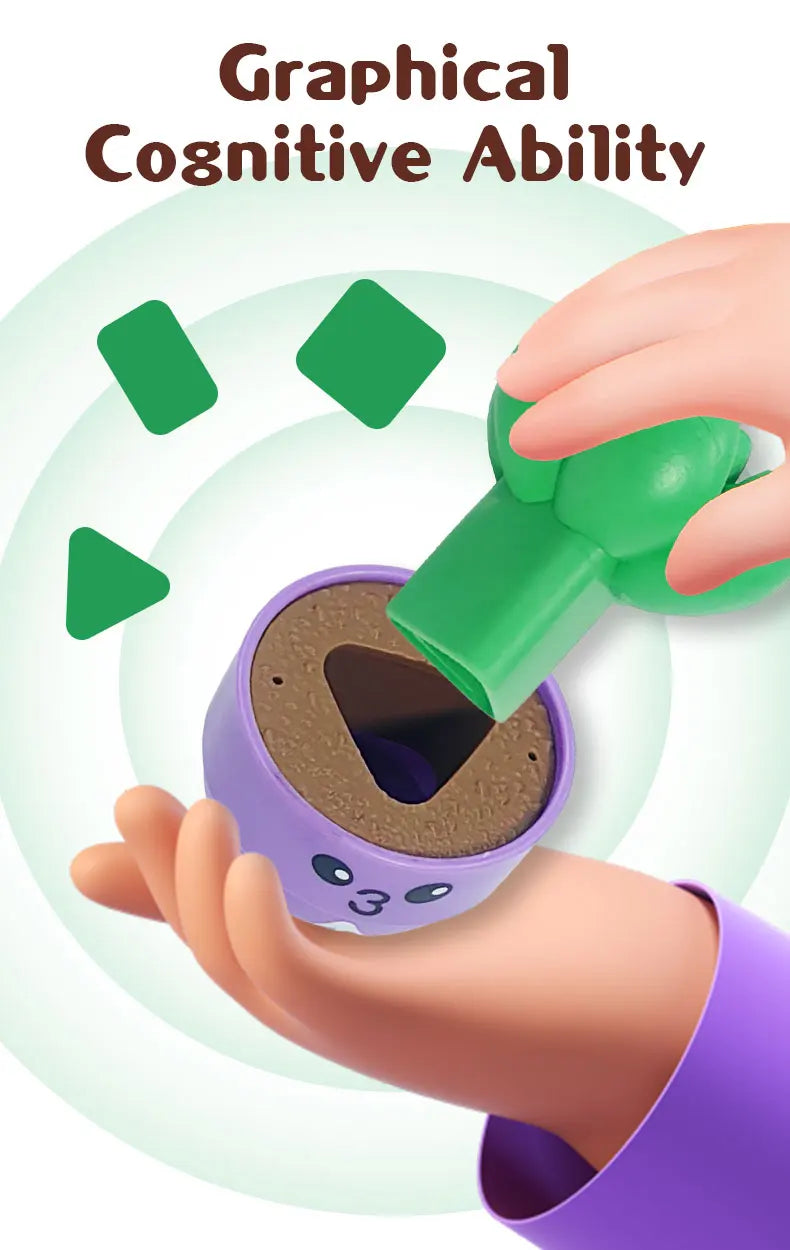 A hand is holding a purple sorting toy with a green piece, demonstrating graphical cognitive ability.