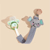 A gray elephant pacifier holder with a clip and a silicone pacifier is shown against a light background.