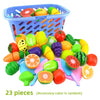A set of 23 pretend play cutting food toys including fruits and vegetables in a blue shopping basket.