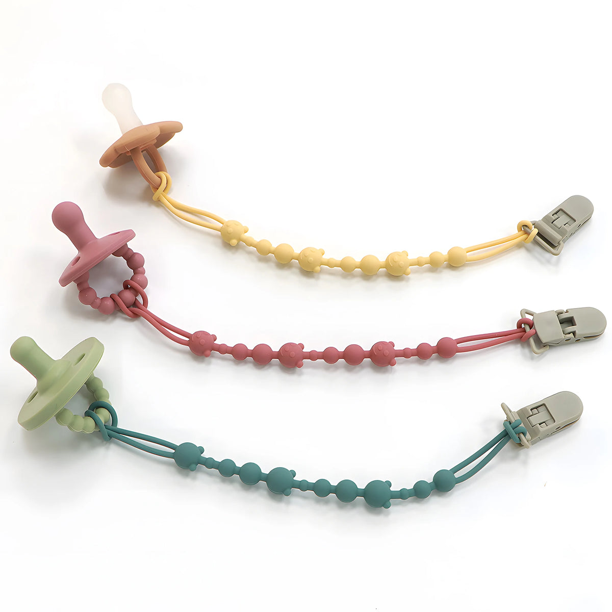 A set of silicone anti-loss pacifier clips in various colors including beige, yellow, pink, and green.