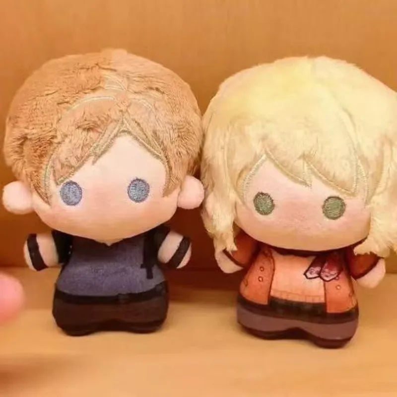 A pair of plush dolls depicting Leon and Ashley from Resident Evil 9 in a casual outfit.