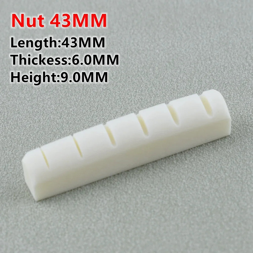 A white guitar nut with a 43MM length, 6.0MM thickness, and 9.0MM height shown on a gray background.