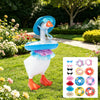 A white goose costume wearing a blue hat, orange beak, and colorful accessories standing in a green garden.