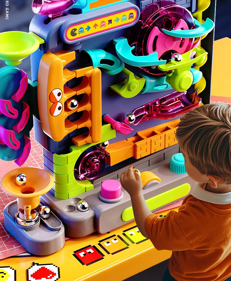 A child plays with a colorful multi-layer rolling ball track adventure toy featuring bright plastic components.