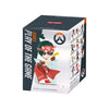 A box for the Overwatch Play of the Game collectible PVC figurine featuring a character in an orange and black outfit.