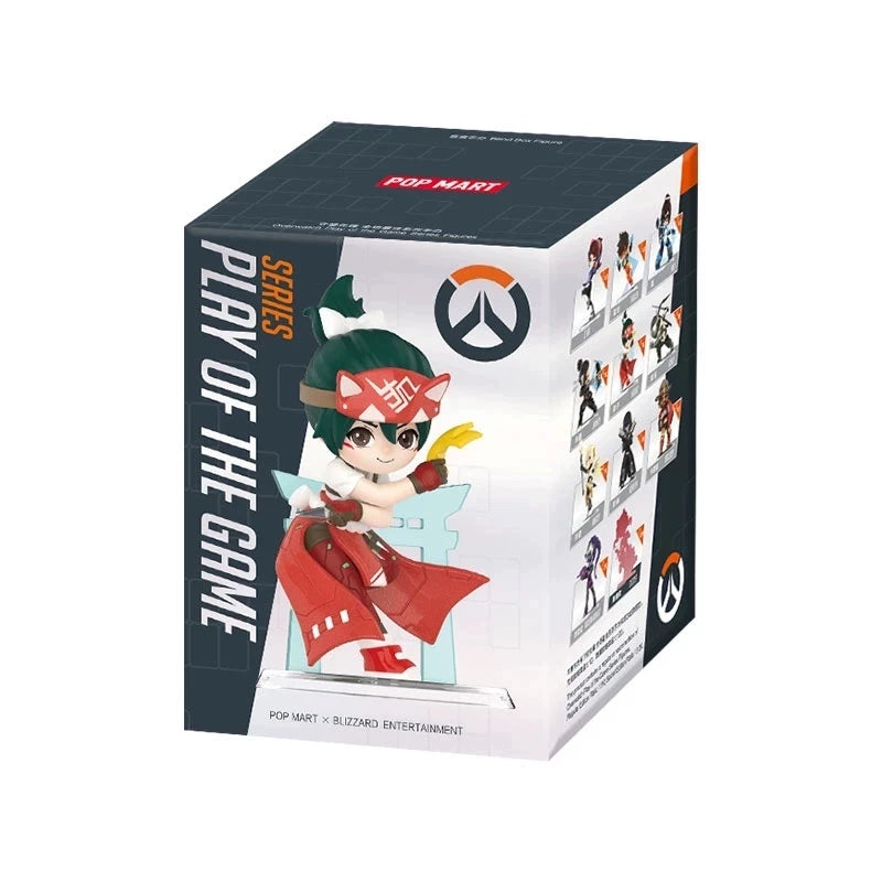 A box for the Overwatch Play of the Game collectible PVC figurine featuring a character in an orange and black outfit.