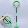 A bright green glowing skip ball for kids with a handle, shown next to a hand holding the ball.