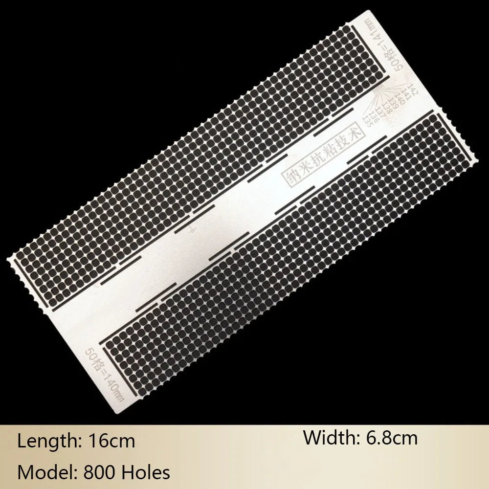 A rectangular stainless steel cross ruler with 800 holes used for diamond painting.