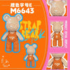 A set of wooden building blocks shaped like a bear, featuring an E-shaped detail display.