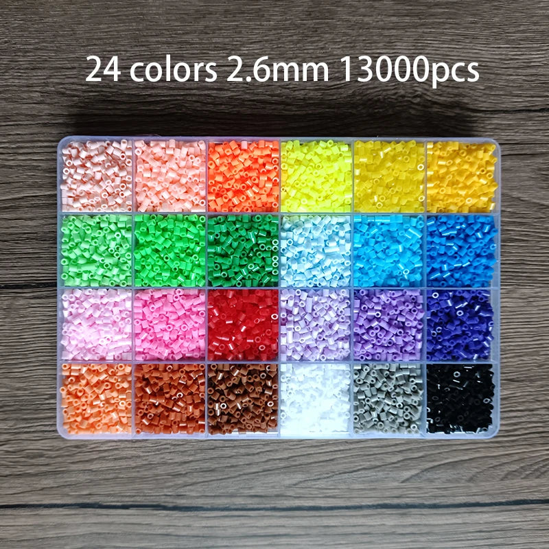 A tray of 13000 small colored fuse beads in 24 vibrant colors arranged in a grid.