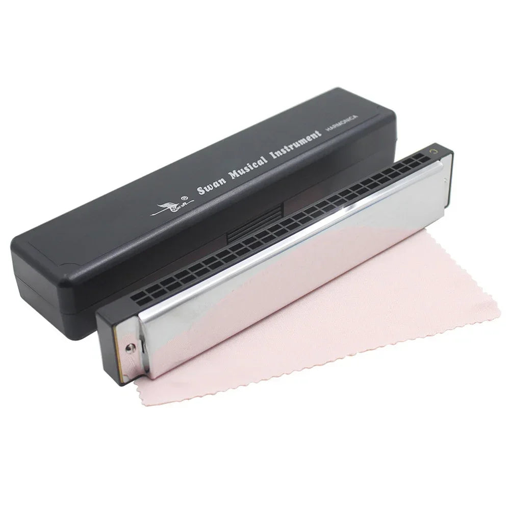 A silver 24-hole tremolo harmonica in C is shown next to its black protective case.