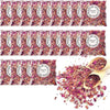A rectangular package of natural dried rose petal confetti with a decorative label and loose petals scattered below.