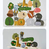 A collection of wooden animal stacking blocks in various colors and shapes for toddlers.