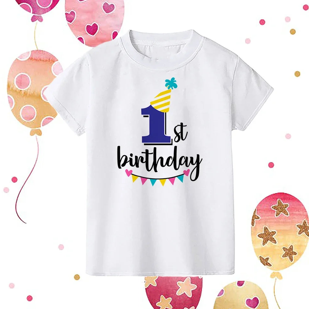 White kids birthday t-shirt featuring a large yellow number 1 and the text 1st birthday in black and pink accents