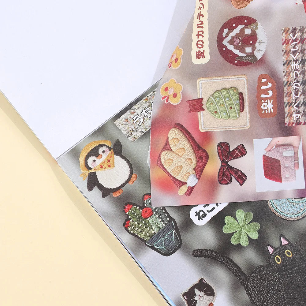 A close-up of a sticker book featuring various kawaii embroidery-style designs and patterns.