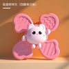 A pink suction cup spinner bath toy shaped like a cute white animal for toddlers.