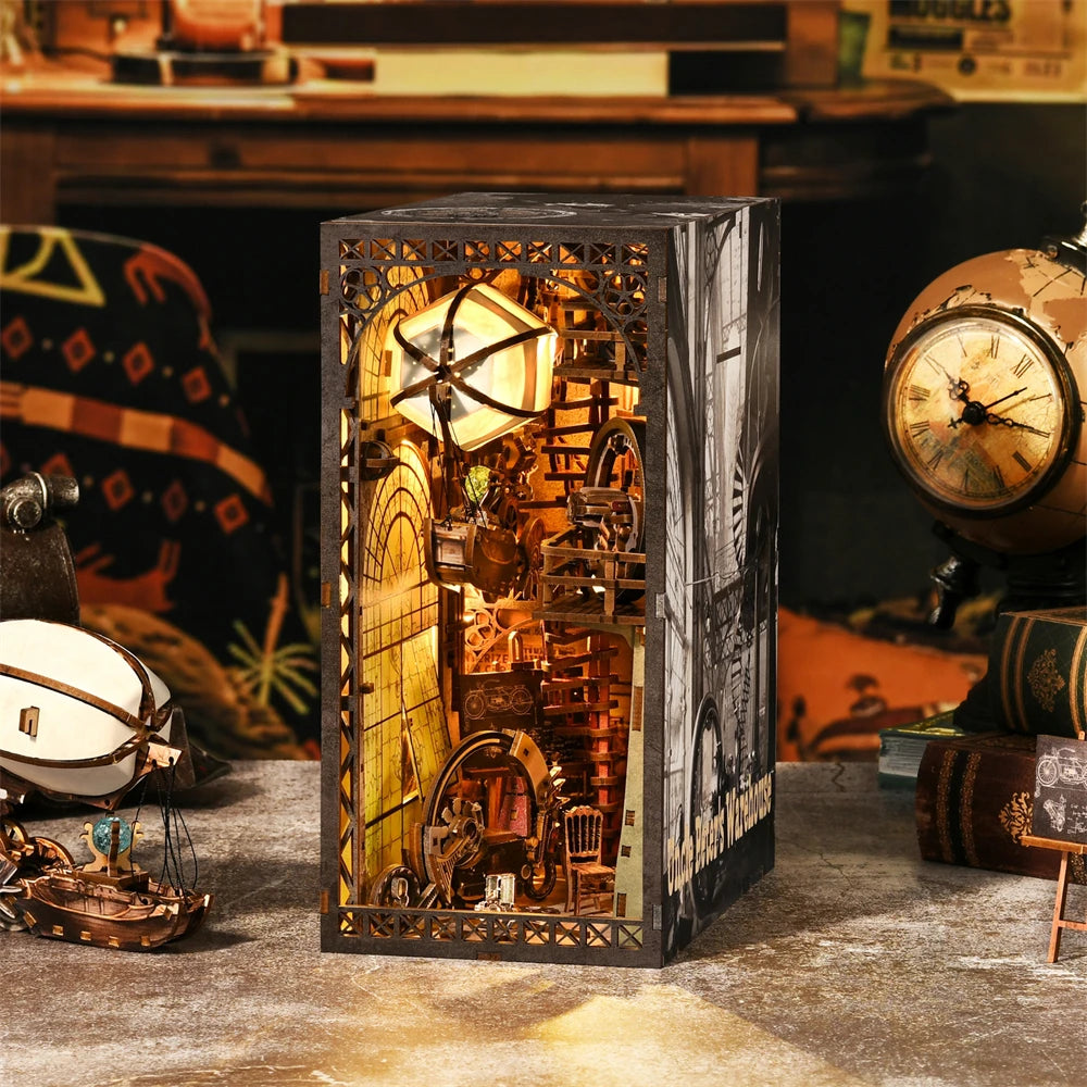 A detailed miniature wooden bookshelf kit featuring an intricate, aged workshop scene with gears and tools.