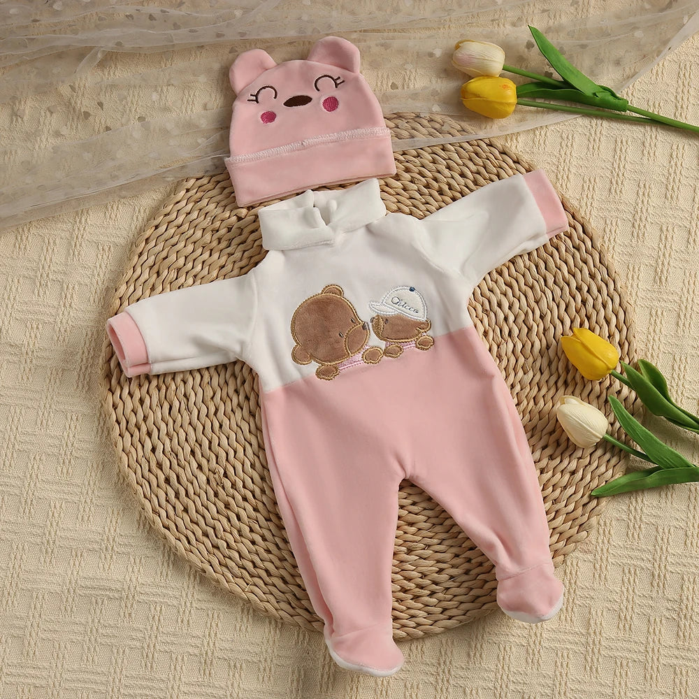 A pink and white animal romper set for a baby, featuring a matching hat and full-body outfit.