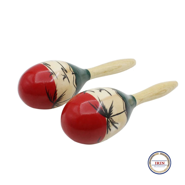 A pair of hand-painted wooden maracas with red and natural wood accents.