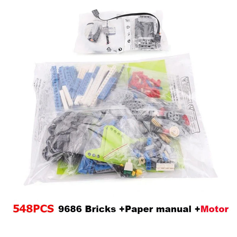 A plastic bag containing a set of 548 pieces of 9686 building blocks, a paper manual, and a motor.