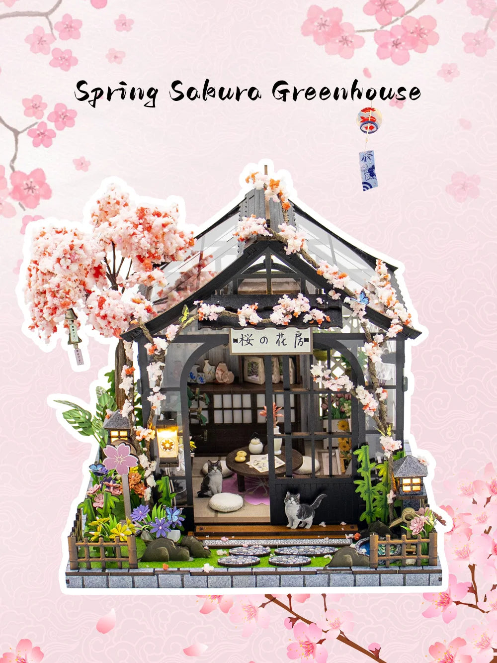 A detailed miniature Japanese tea house diorama featuring a traditional wooden structure, pink blossoms, and mossy landscapin