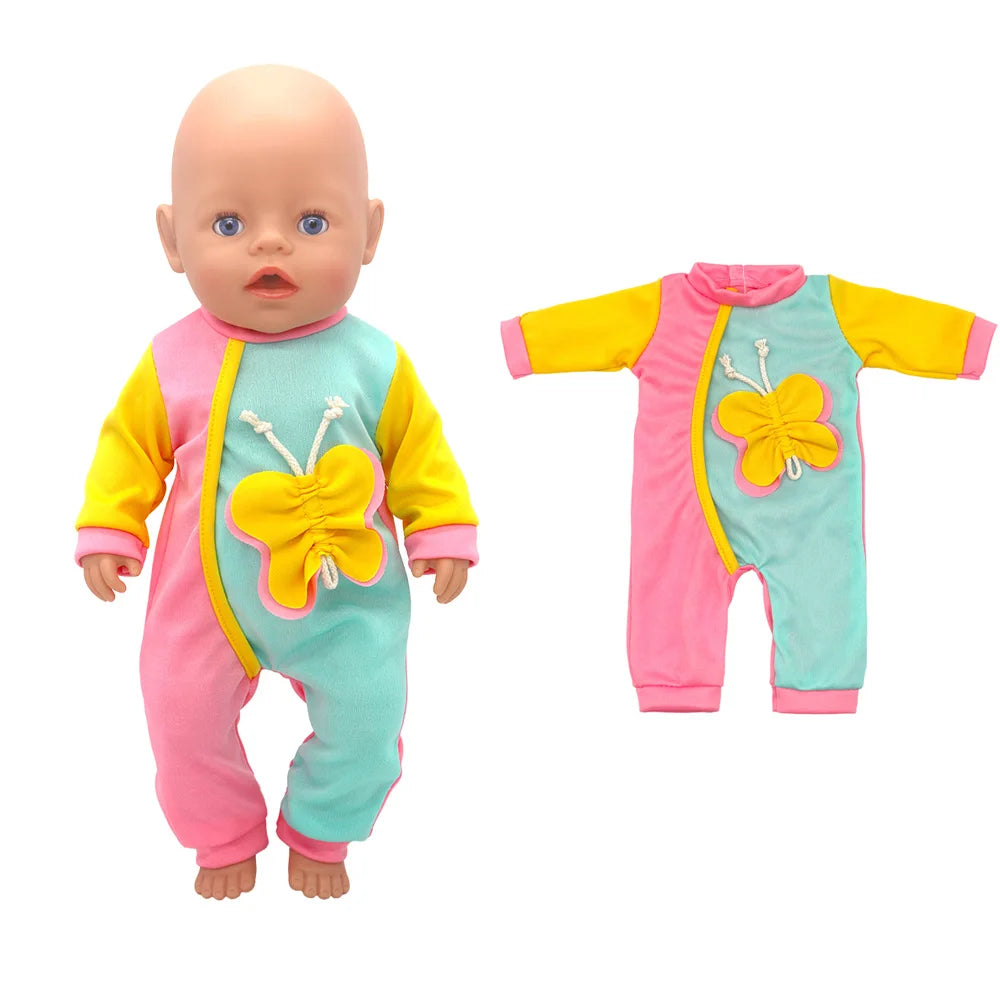 A baby doll wearing a pink and yellow outfit set with a yellow flower accessory.