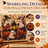 A decorative panel featuring Halloween ghosts and pumpkins made with shimmering pearl beads for seasonal decor