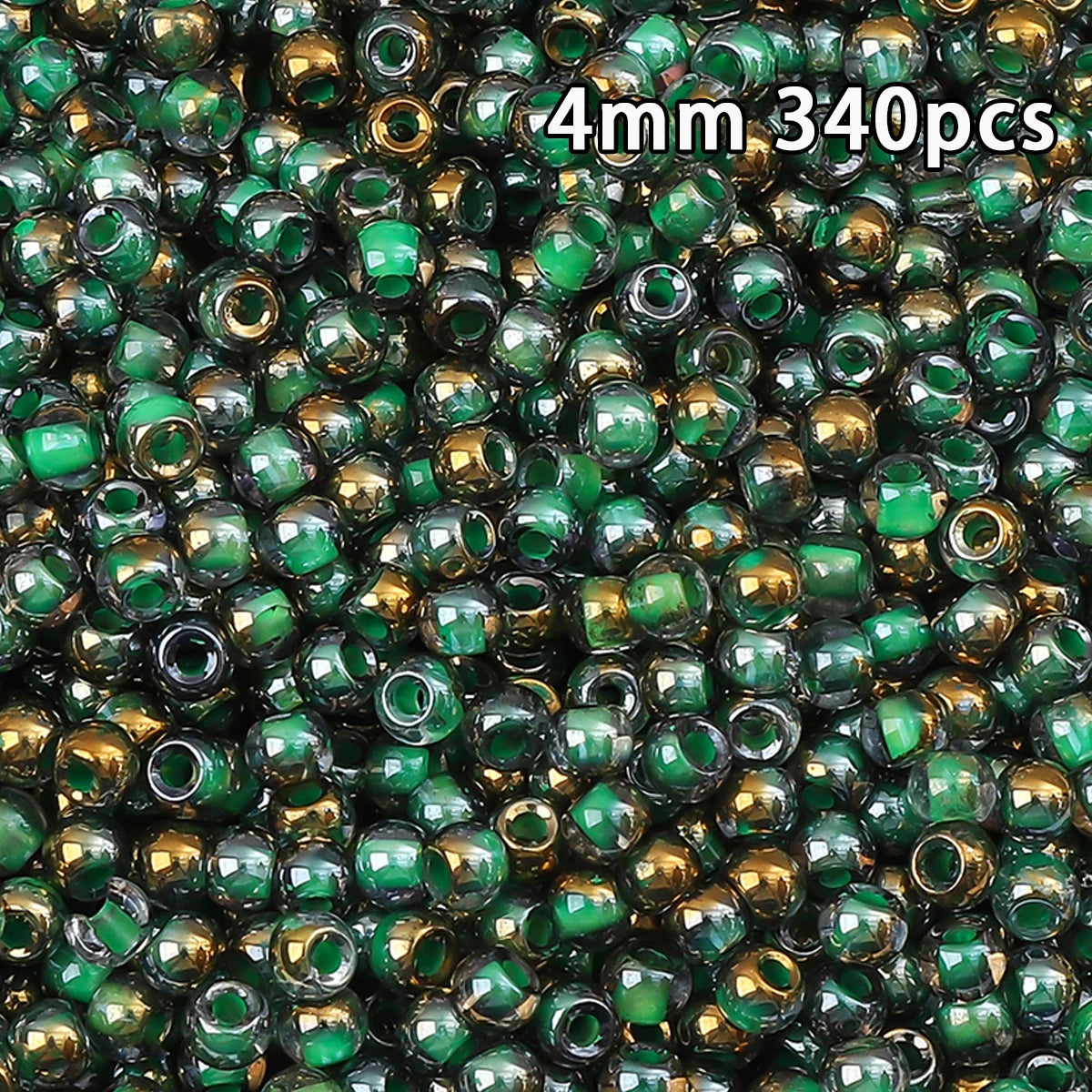A close-up view of 340 golden gradient glass beads with green accents.