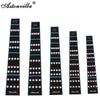 A set of black violin fretboard note stickers for beginners, showing various musical notes.