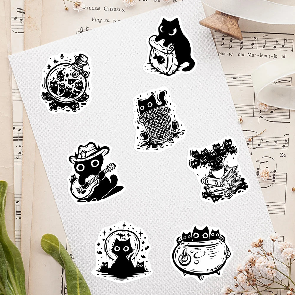 A pack of black cat fantasy stickers on a white background