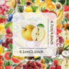 A close-up of various colorful fruits like apples, berries, and citrus slices arranged around a transparent sticker with dime