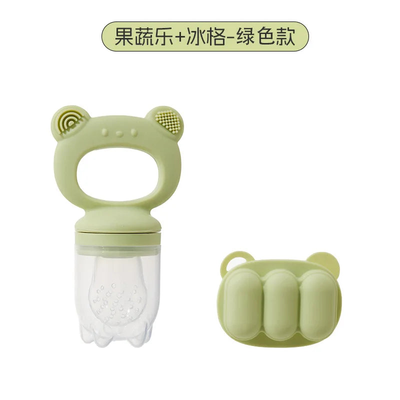A set of silicone fruit teethers in a light green color, featuring an open-mouth teether and a fruit-shaped silicone toy.