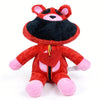 A plush doll of CatNap with red and black fur and large ears.