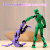A green and purple 3D movable joints man and dog figure standing on a wooden surface.