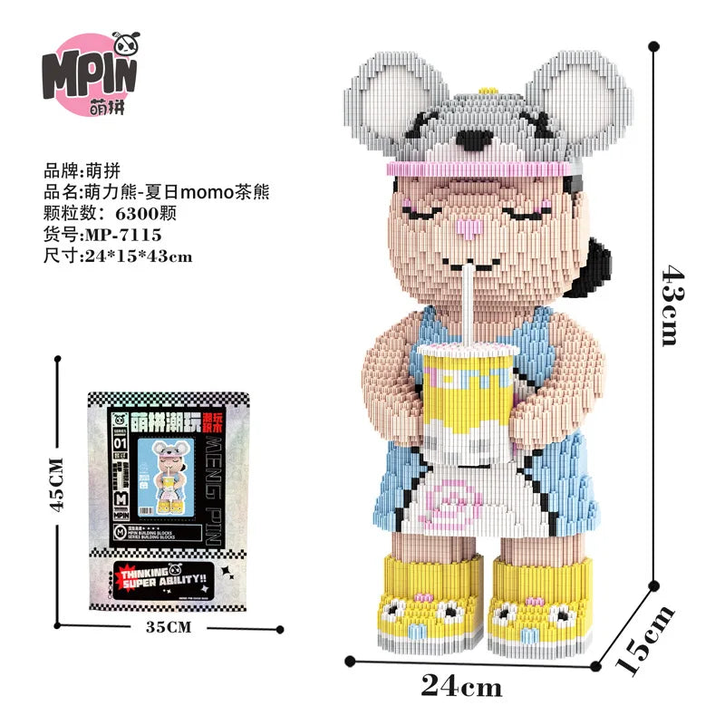 A cute bear figure made of micro building blocks with pink accents and a striped shirt.