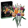 A box of Everlasting Flower Building Block Bouquet Set featuring various dried and preserved flowers in shades of pink, purpl