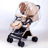 A beige universal stroller rain cover with a clear plastic hood is shown on a black stroller frame.