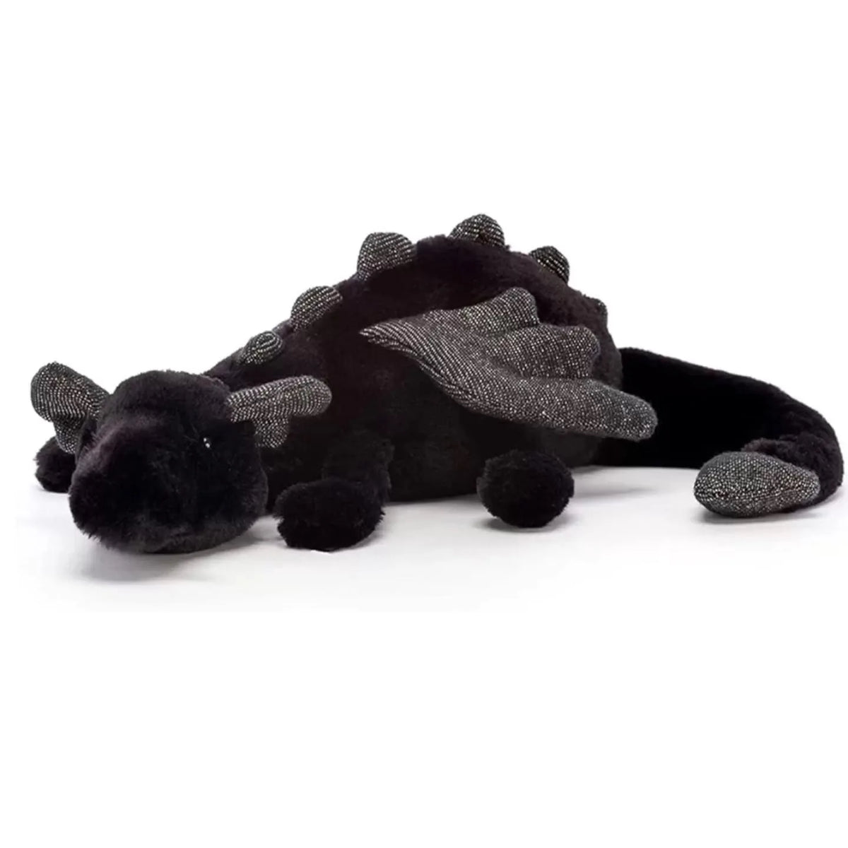 A black and silver rainbow dragon plush pillow with soft fur texture.