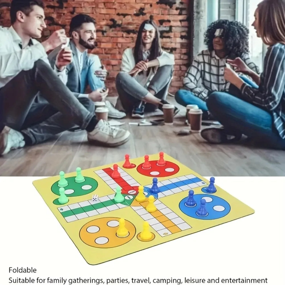 A yellow foldable Ludo board game with colorful pieces is shown in a casual indoor setting.