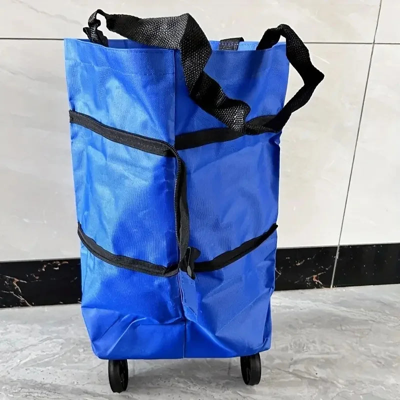 A bright blue foldable shopping bag with black straps is shown standing on a wheeled cart.