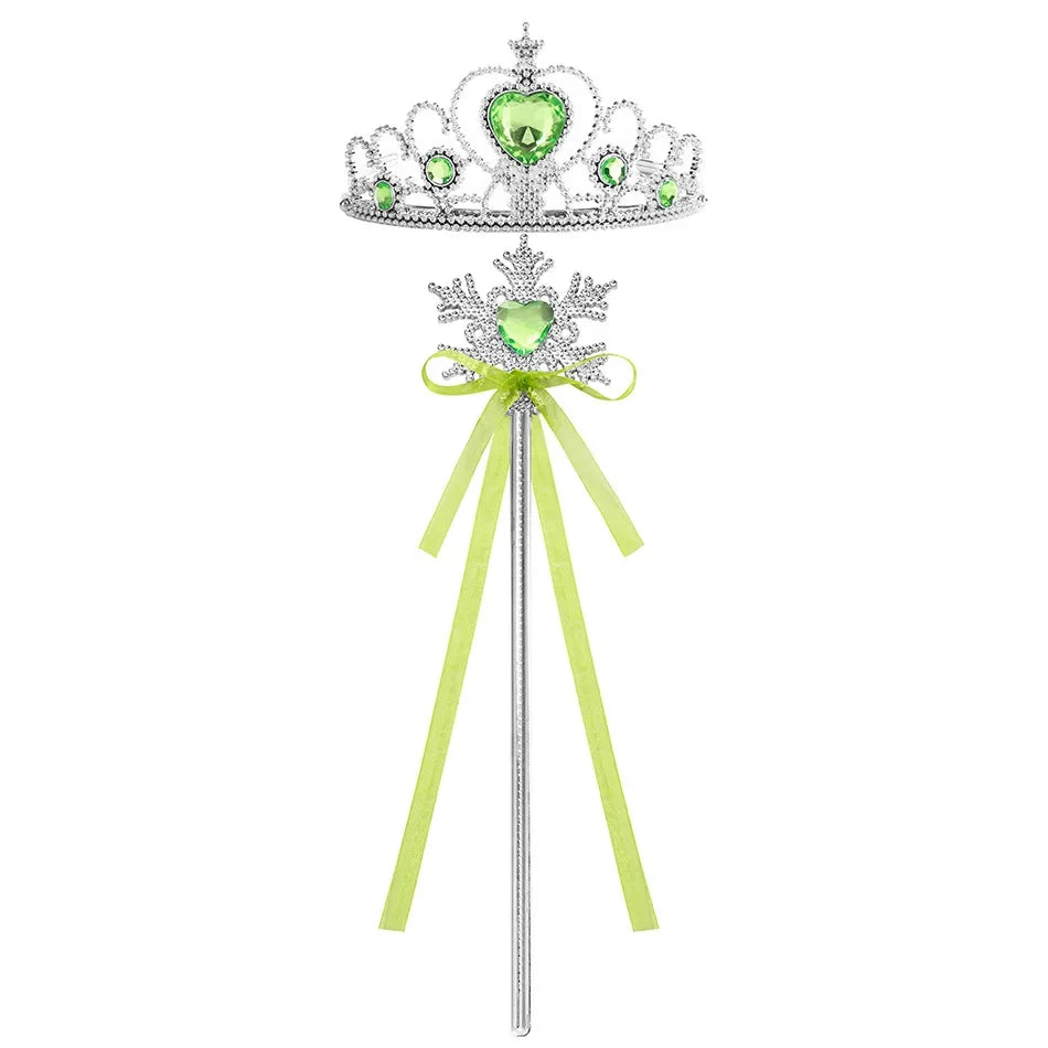 A silver and green crown playset with a large emerald-green gemstone and a light green ribbon streamer.