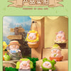 A collection of Lulu the Piggy Garden series figurines, including a pig, in various colors and packaging.