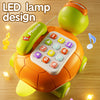 A bright orange and green musical crawling turtle toy shaped like a phone for babies.